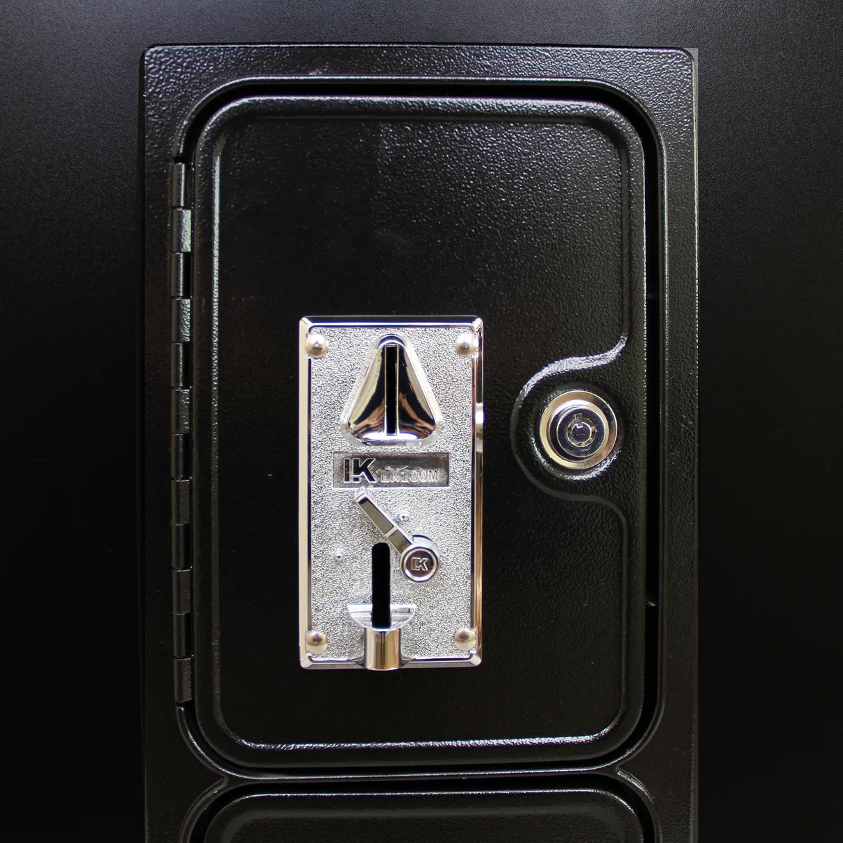 Retro cocktail table arcade games machine featuring a sleek black finish and a shiny chrome coin slot for classic gaming fun