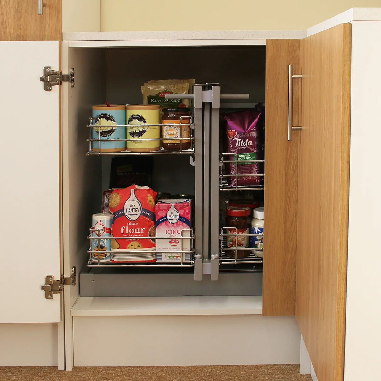 KuKoo Magic Corner Pull Out Kitchen Cupboard Drawers in a right-hand configuration, featuring organized shelves with various food items and jars