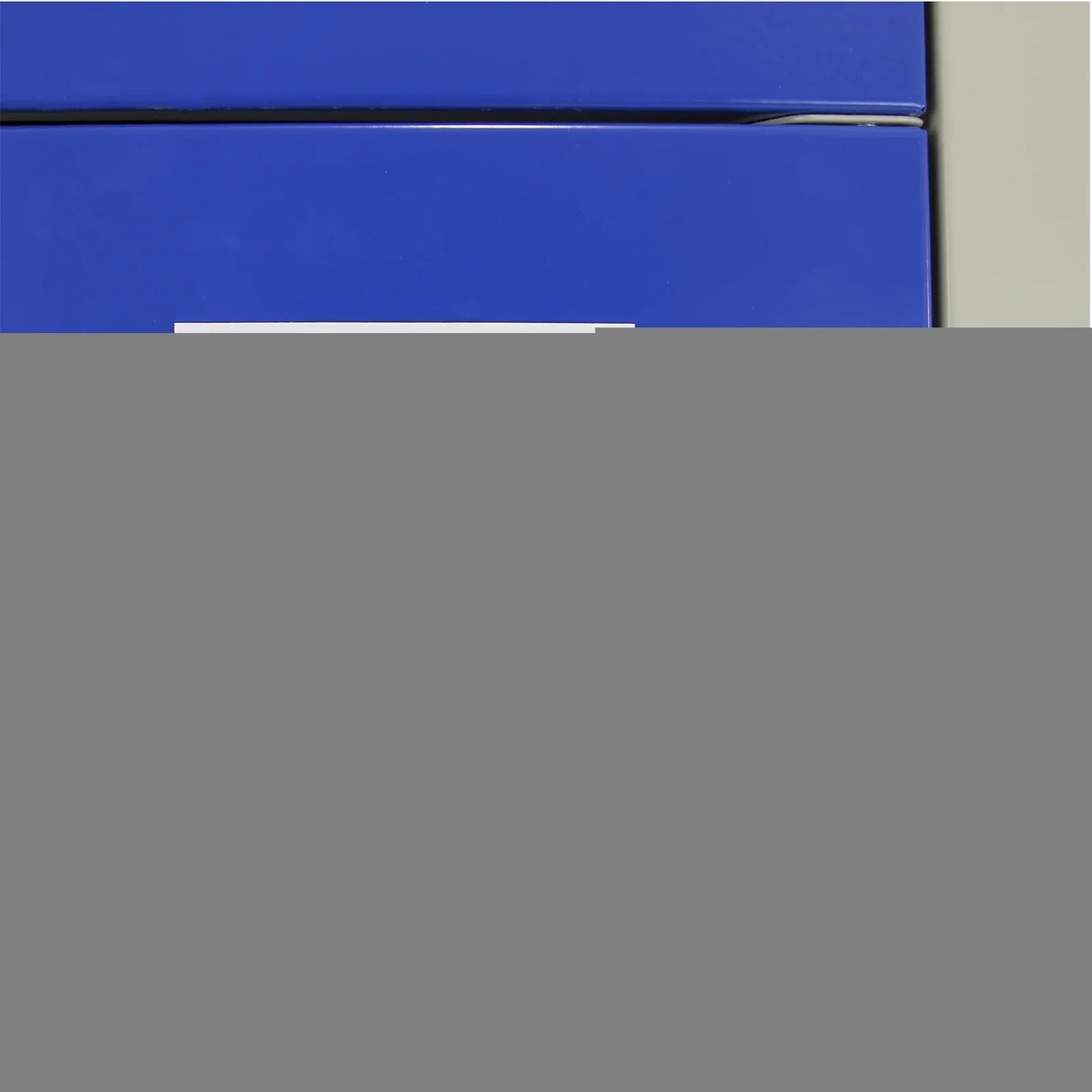 Blue metal storage lockers with two doors, featuring a sleek flatpack design and a smooth, durable finish