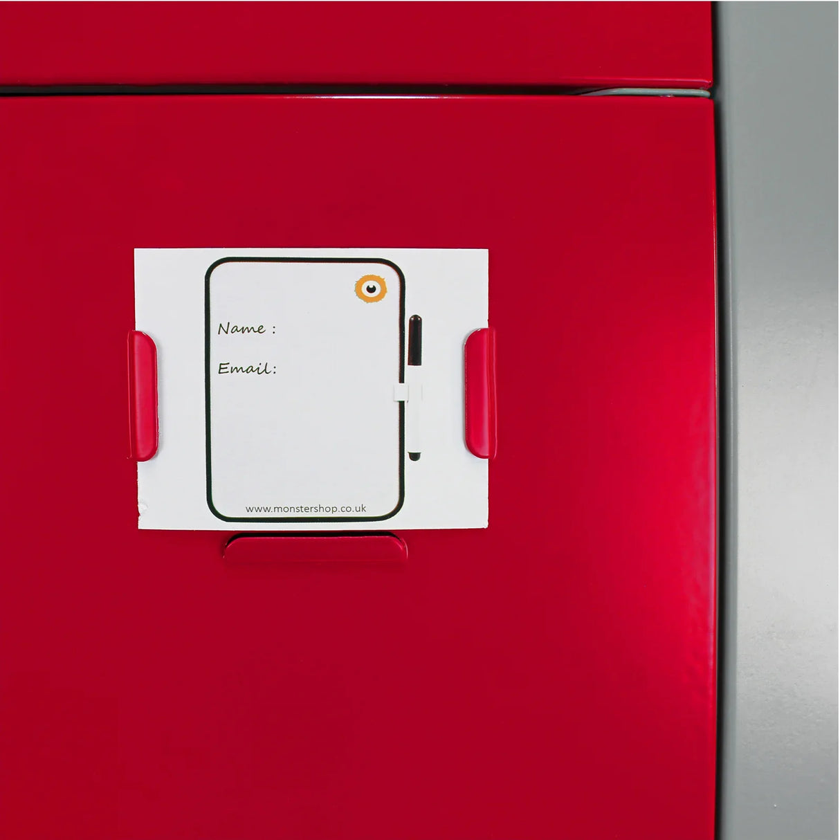 Red metal storage locker with three doors, featuring a name tag holder and smooth, glossy finish for easy identification