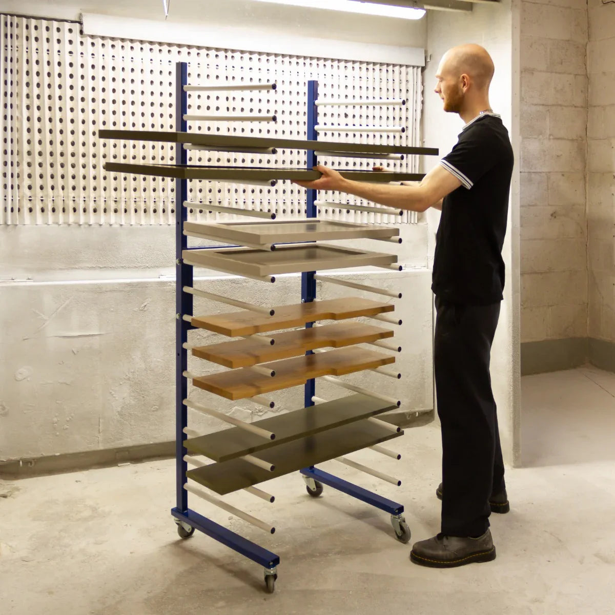 Monster Racking Spray Drying Rack Trolley with multiple shelves in various colors, sturdy metal frame, and smooth-rolling wheels
