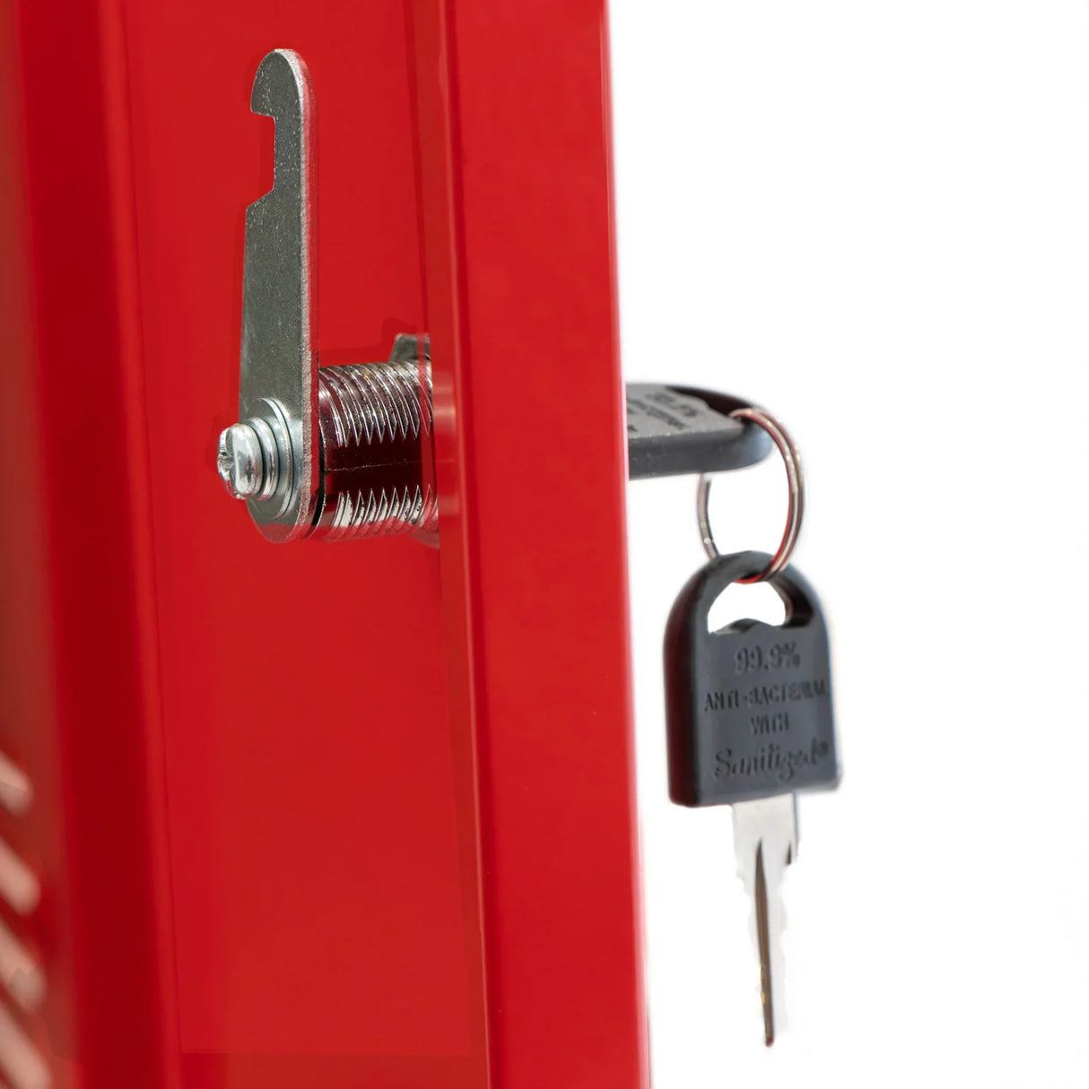 Close-up of a red metal storage locker door with a key lock, showcasing the shiny finish and sturdy construction details