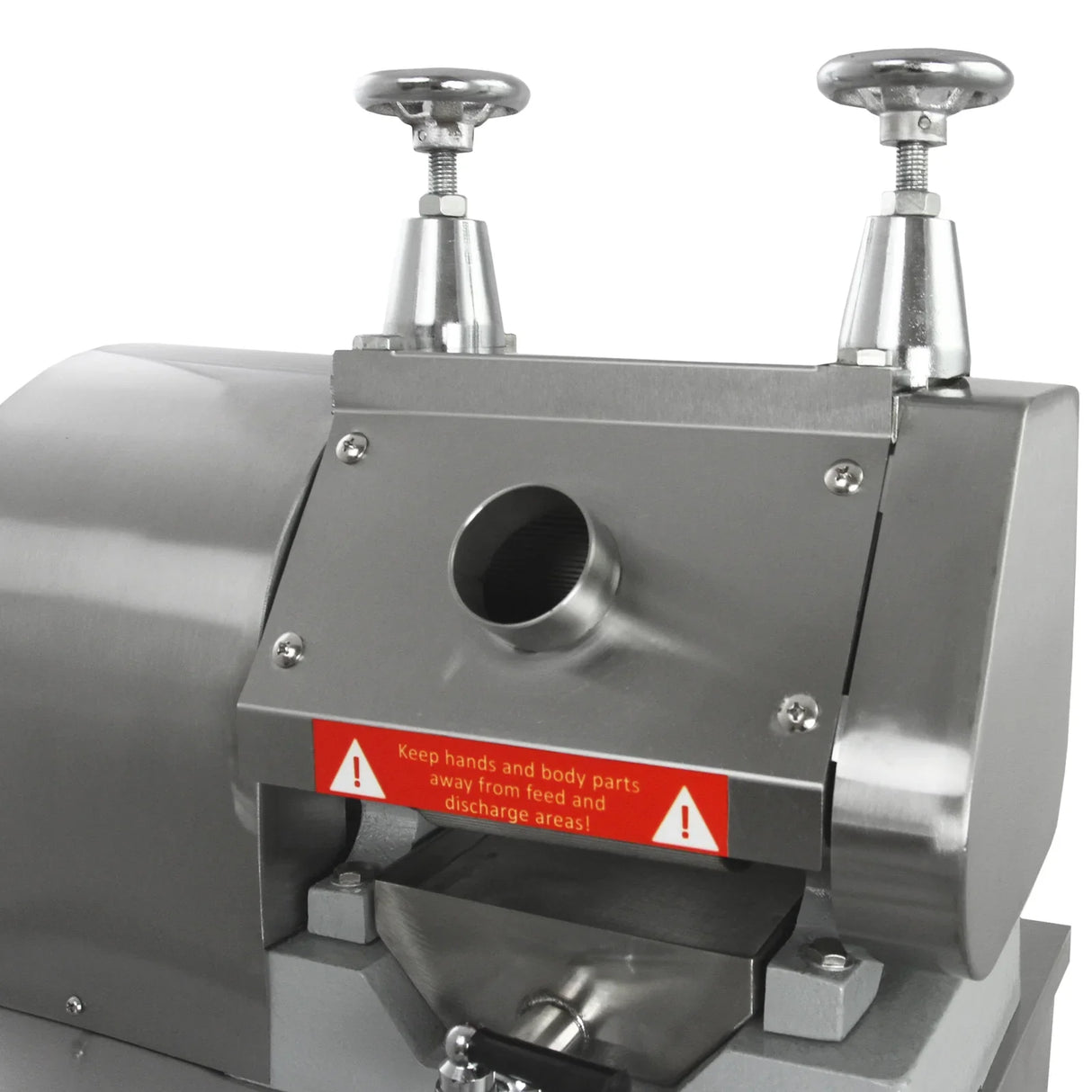 Stainless steel KuKoo sugar cane press with a wide feed opening, safety warning labels, and sturdy handles for easy operation