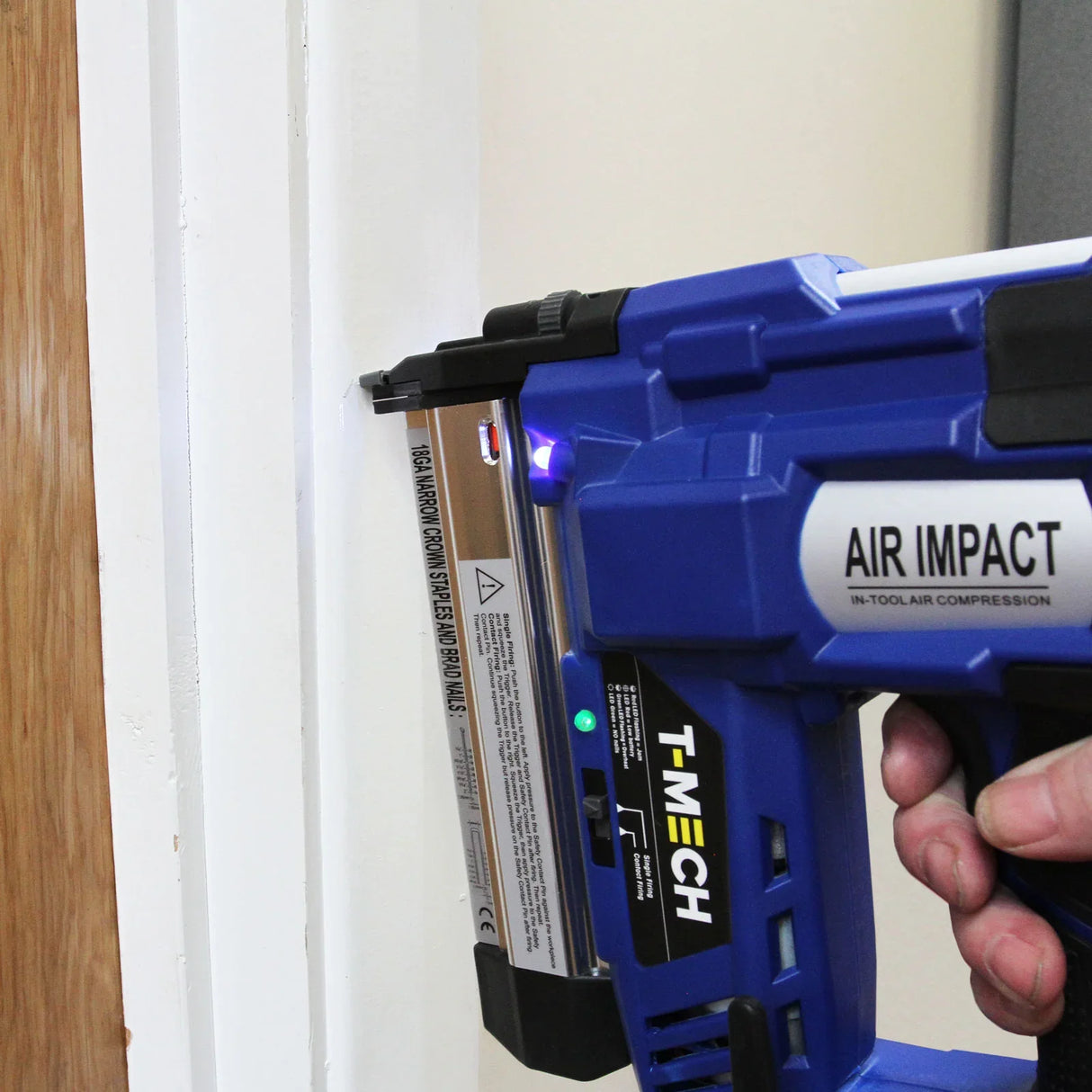 T-Mech Nail & Staple Gun in blue, featuring an ergonomic grip, LED indicator, and air impact technology for precise fastening