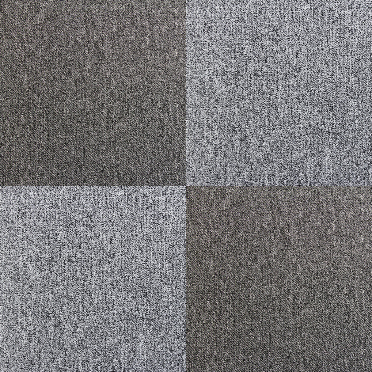 Anthracite grey carpet tiles featuring a textured surface, arranged in a square pattern, ideal for modern flooring solutions