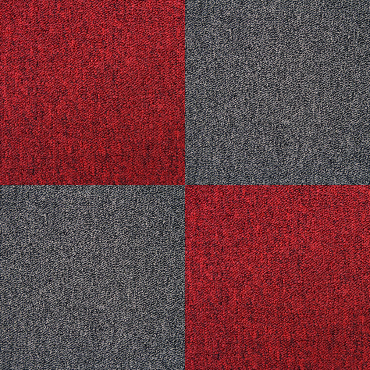Charcoal black carpet tiles featuring a textured surface, ideal for modern interiors, showcasing a durable and stylish design