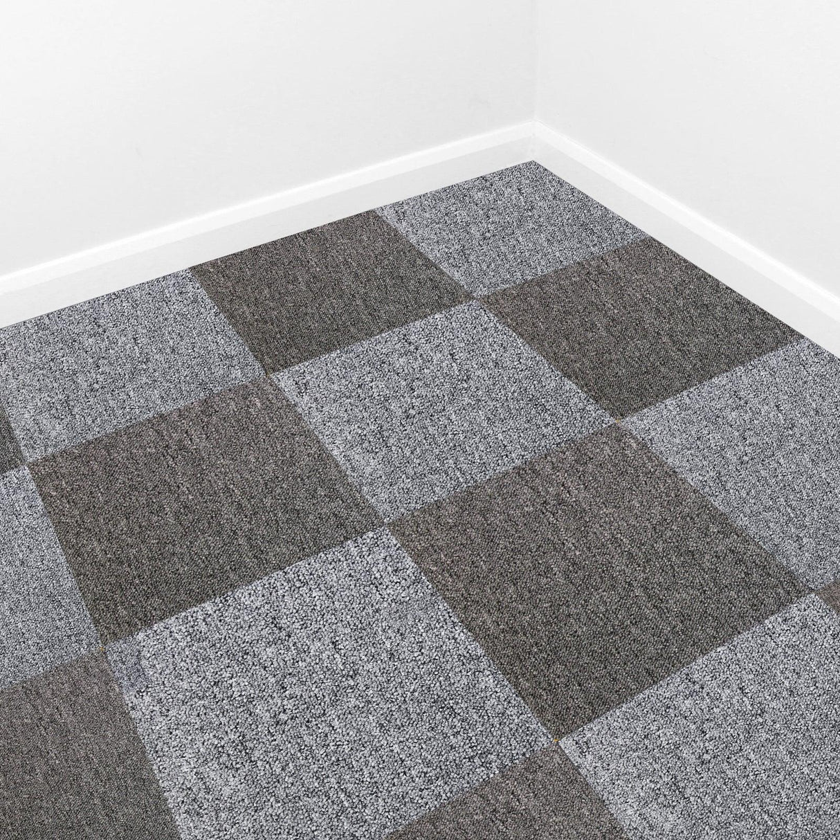 Platinum grey carpet tiles arranged in a checkerboard pattern, showcasing a soft texture and modern design for versatile flooring solutions