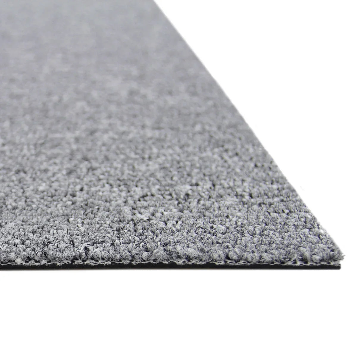 Platinum grey carpet tile with a soft, textured surface, showcasing a close-up of the edge for detail and thickness, ideal for flooring