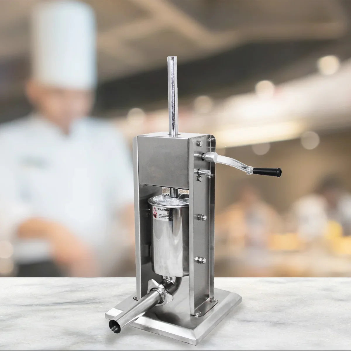 Kukoo 5 litre sausage stuffer in stainless steel with a sturdy base, lever handle, and a wide filling tube for easy sausage making