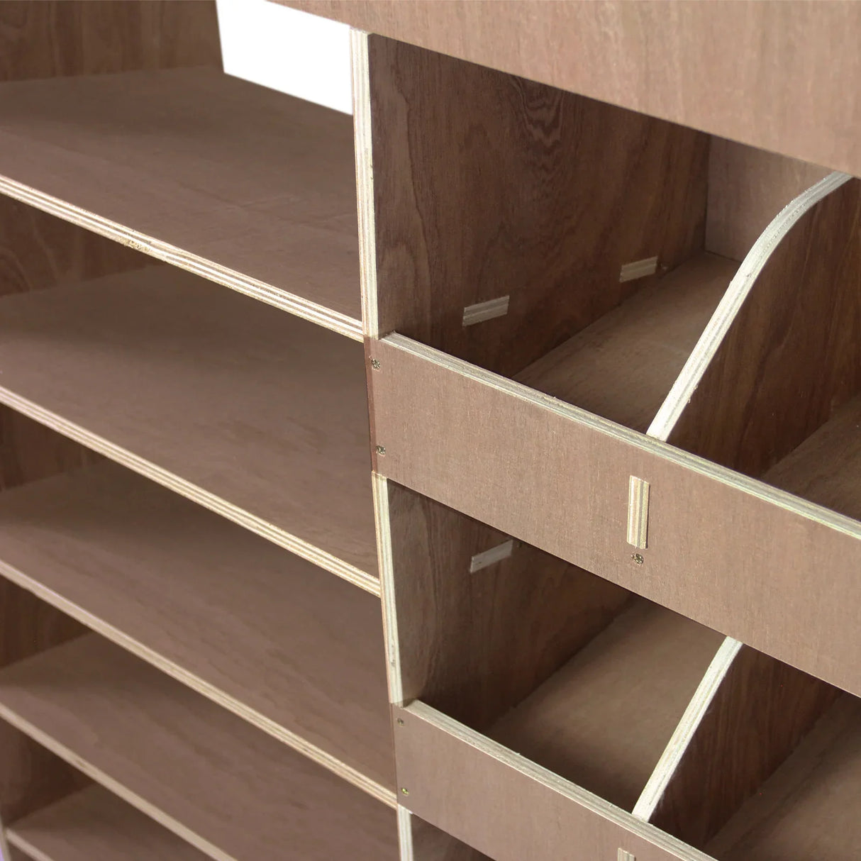 Vauxhall Vivaro SWB plywood van racking unit featuring multiple shelves and compartments, showcasing a smooth wood texture and sturdy design