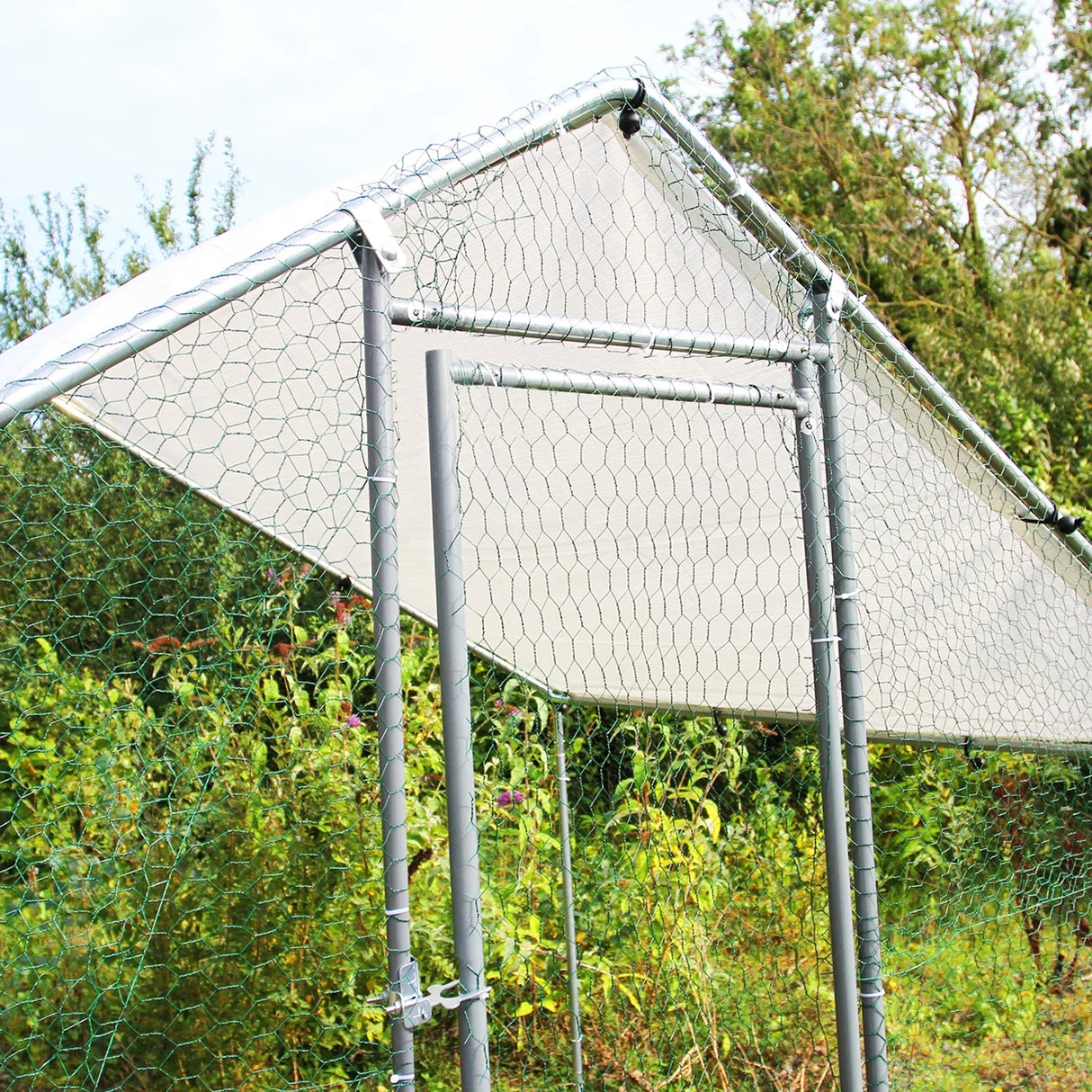 Durable chicken run measuring 3m x 2m x 2m with a sturdy metal frame, hexagonal wire mesh, and a protective roof for outdoor use