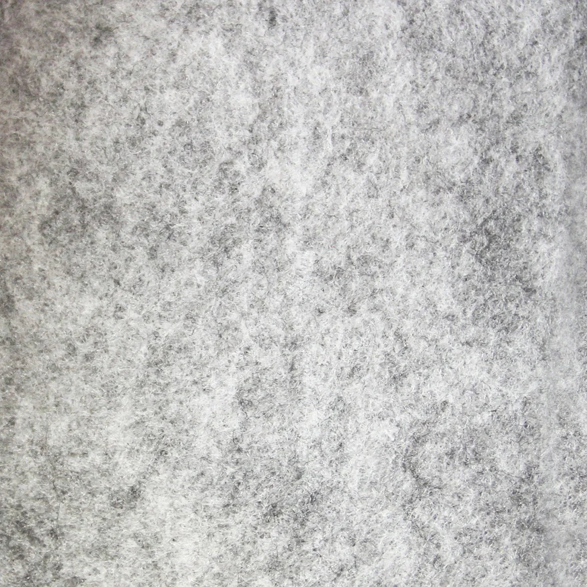 Textured silver van lining material showcasing a soft, felt-like surface, ideal for VW Caddy racking unit installation