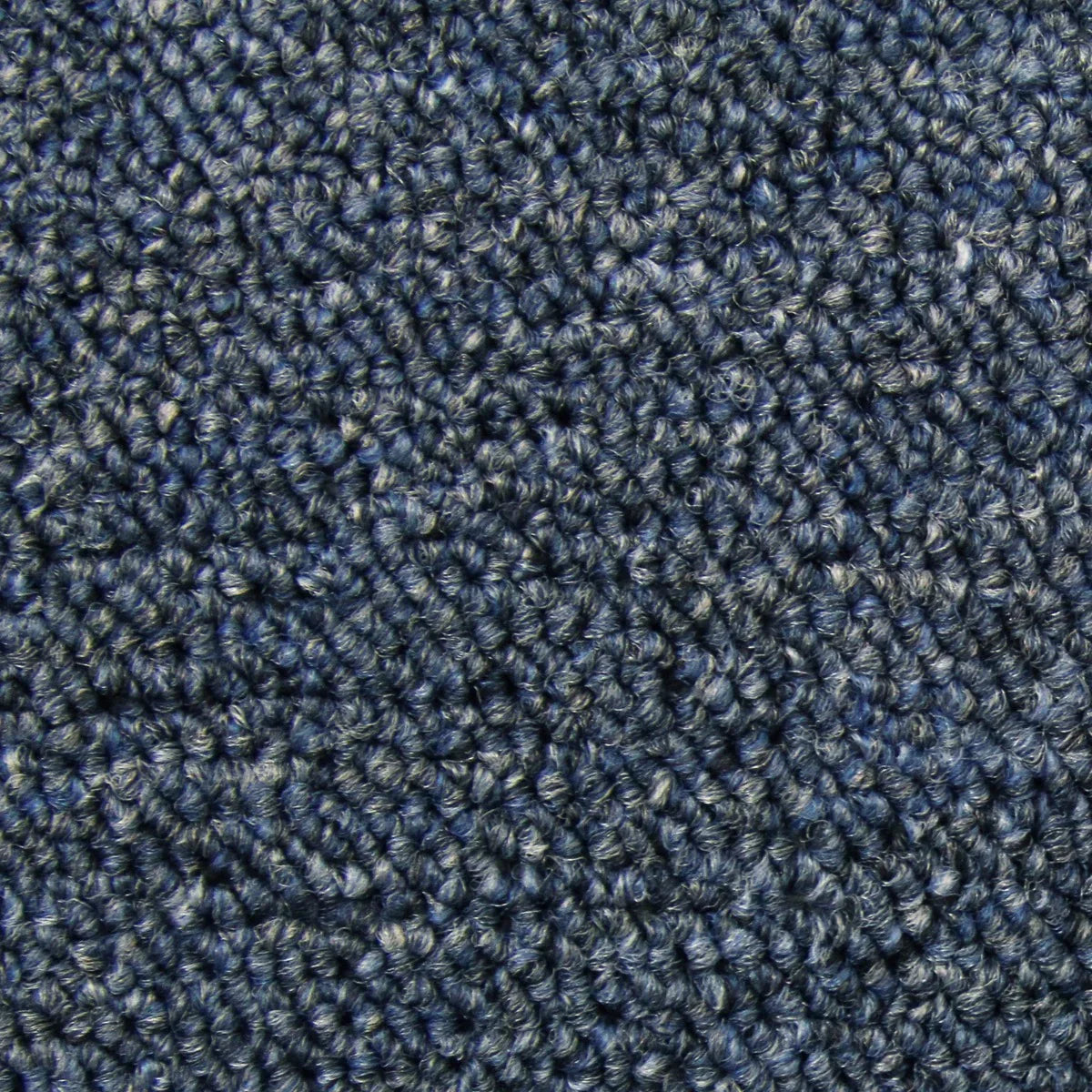 Storm blue carpet tiles featuring a textured, woven surface, ideal for adding a modern touch to any space with a durable finish