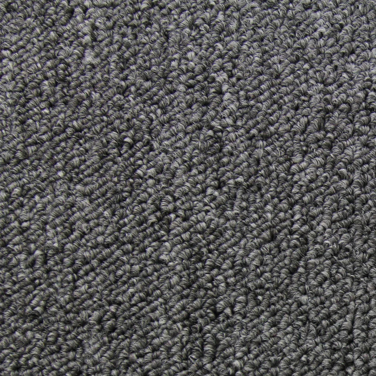 Anthracite grey carpet tiles with a textured, loop pile surface, ideal for stylish and durable flooring solutions in various spaces