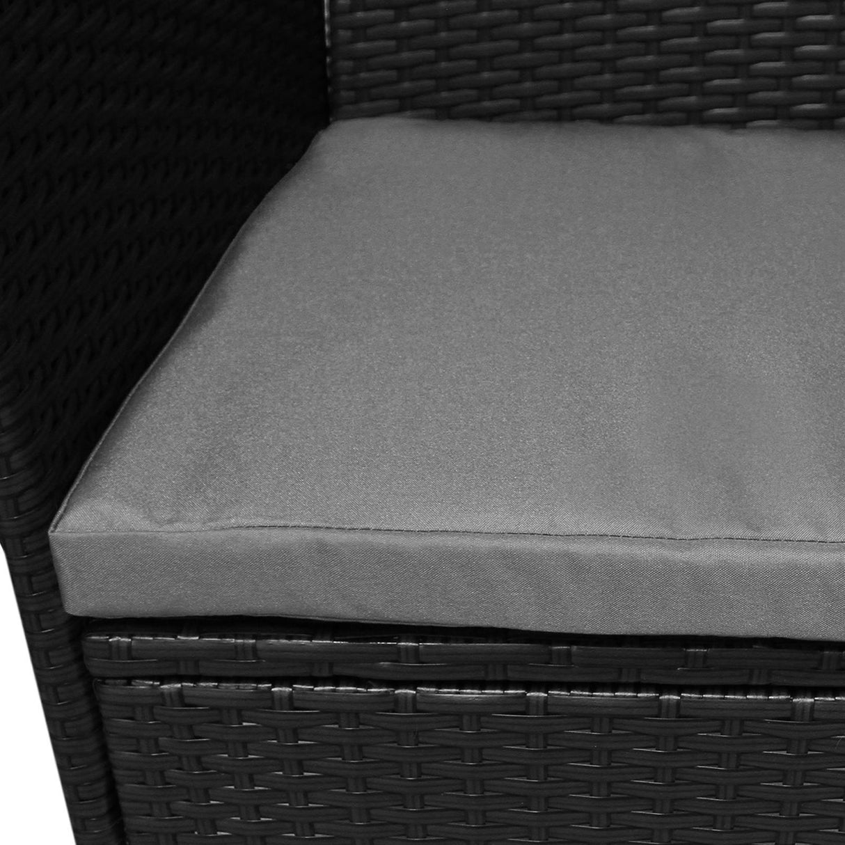 Black rattan bistro set featuring a plush gray cushion, ideal for outdoor dining or cozy balcony seating
