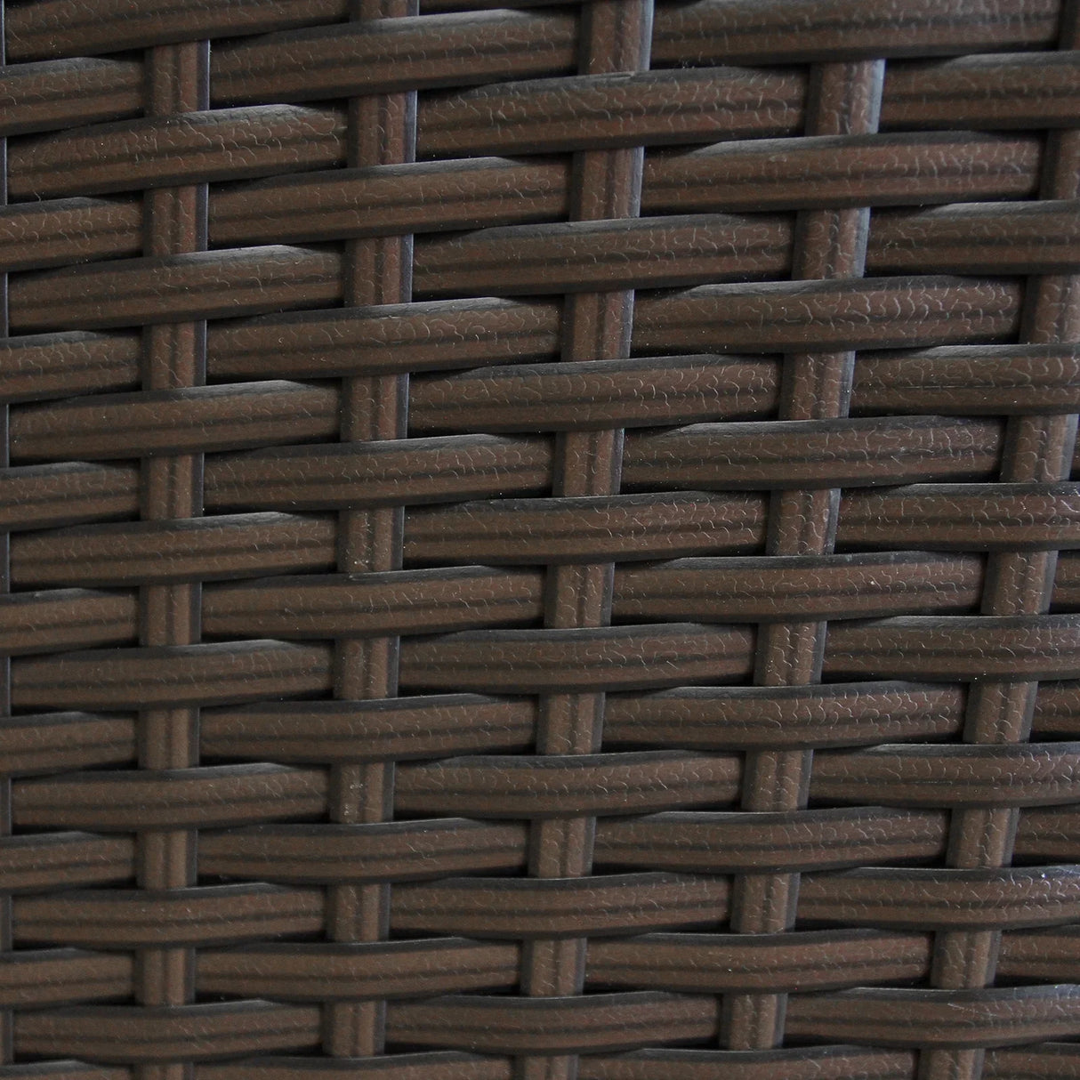 Close-up of the brown rattan weave texture on the Jardí Bistro Set, showcasing its durable and stylish design for outdoor use