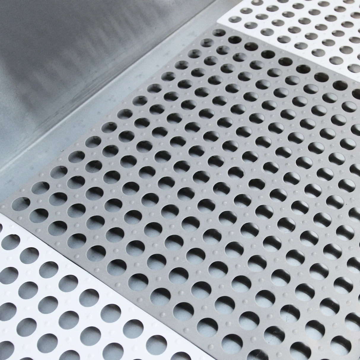 Steel dog bath tub washing station featuring a textured, perforated floor for drainage and stability, designed for easy pet bathing