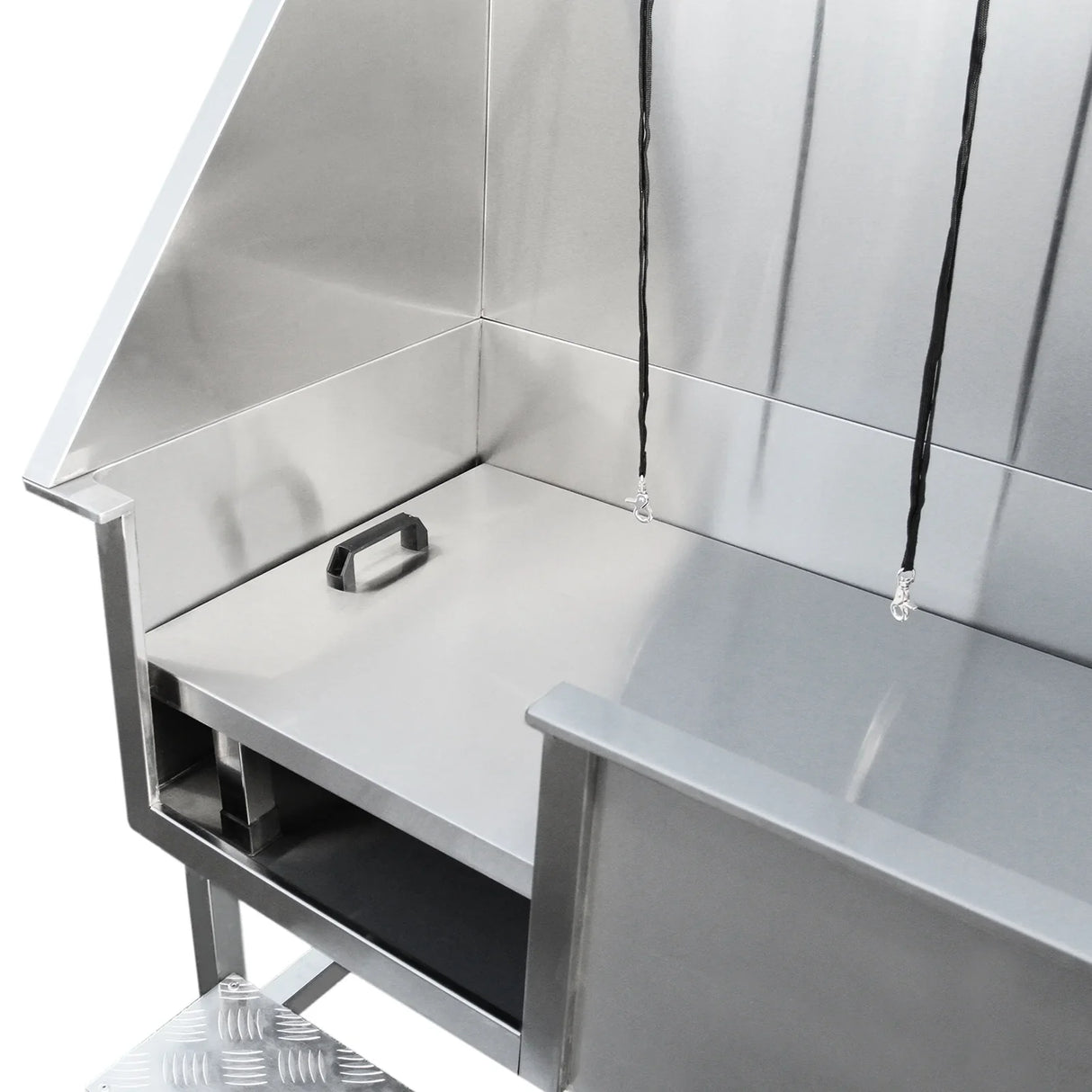 Stainless steel dog grooming bath station with a smooth surface, drainage area, and adjustable restraints for secure pet washing
