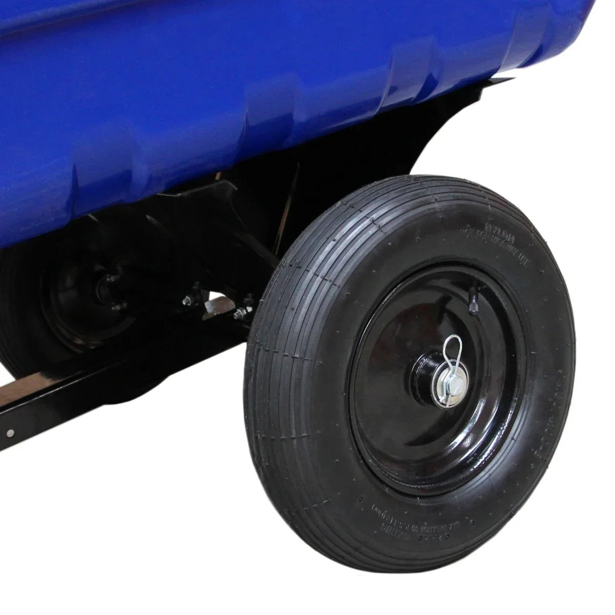 Blue ATV tipping trailer with pneumatic tyres, showcasing a sturdy wheel design and durable construction for heavy loads