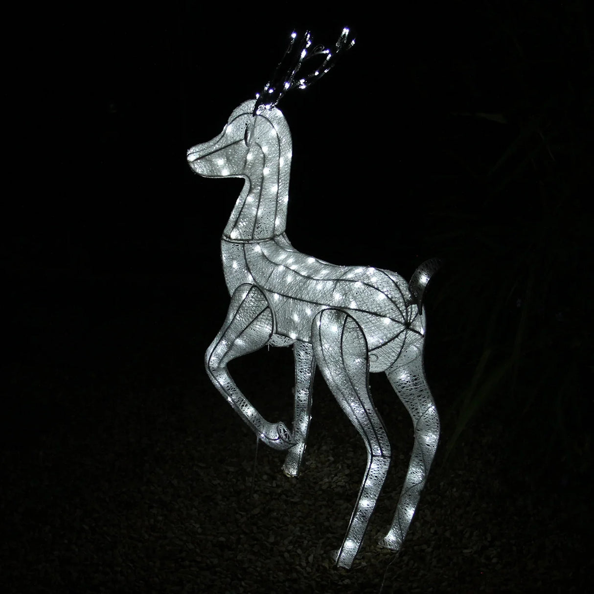 Large light-up stag reindeer with a sleek white frame, illuminated by bright LED lights, showcasing elegant antlers and a graceful pose