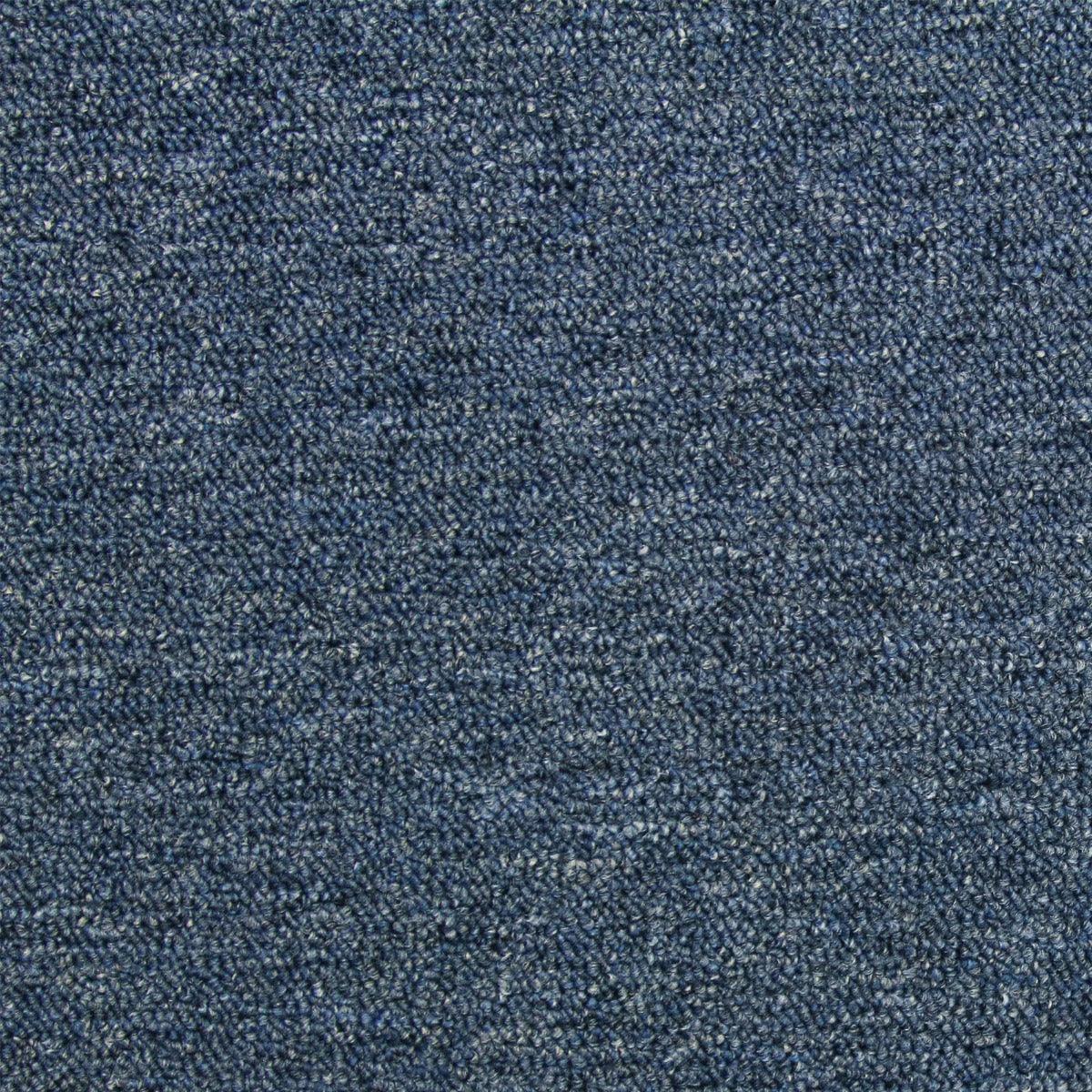 Storm blue carpet tile texture featuring a soft, woven surface, ideal for modern interiors, showcasing durability and style