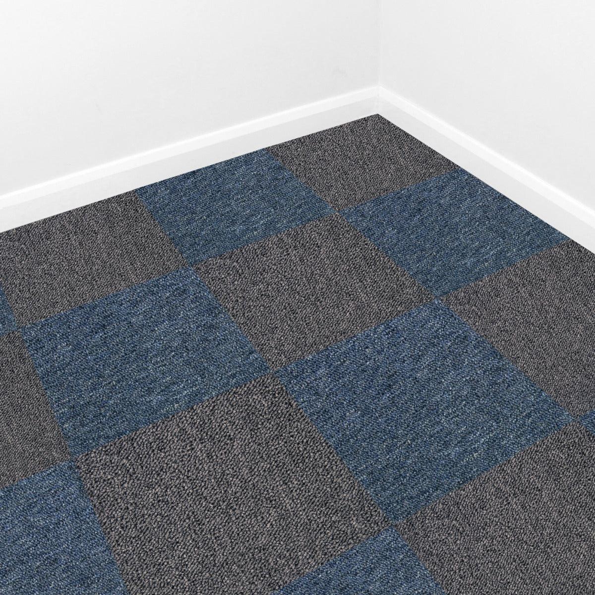 Storm blue and charcoal black carpet tiles arranged in a checkerboard pattern, showcasing a textured, durable finish for modern spaces