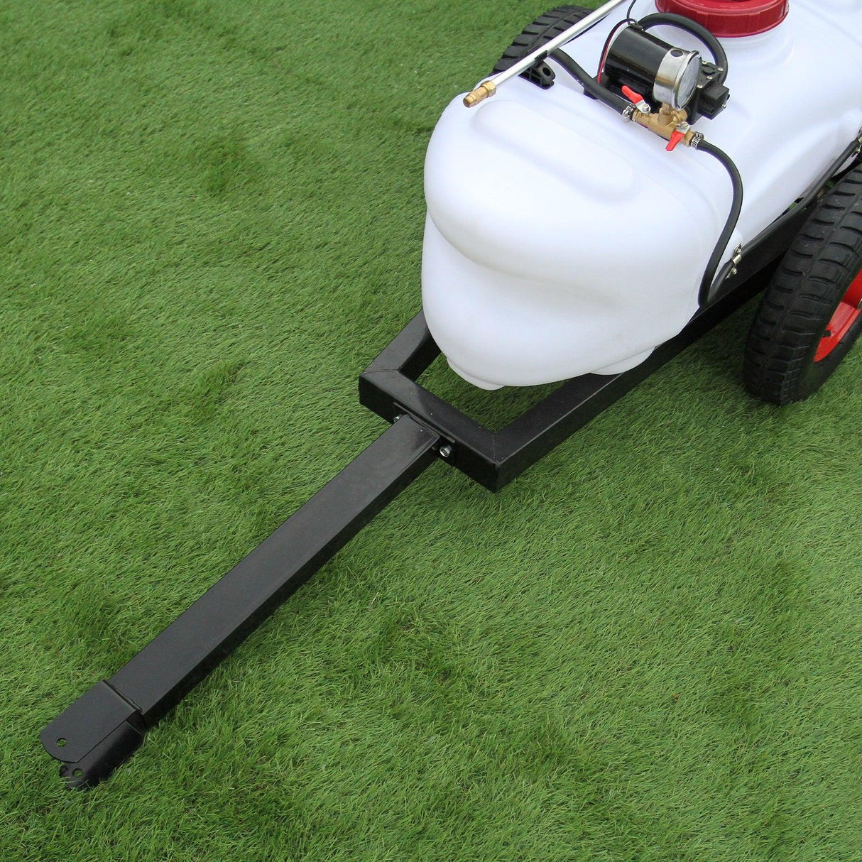 60L ATV trailer and sprayer with a white tank, black metal frame, and red wheels, designed for efficient outdoor spraying tasks