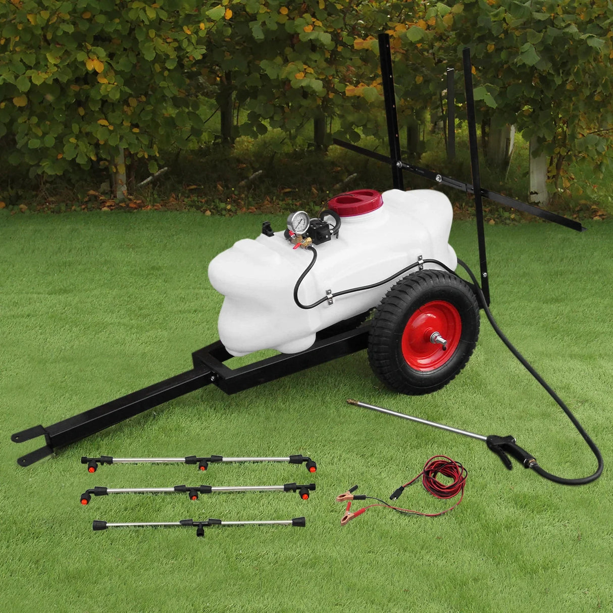 100L ATV trailer sprayer with white tank, red accents, black frame, and adjustable spray nozzles on green grass background