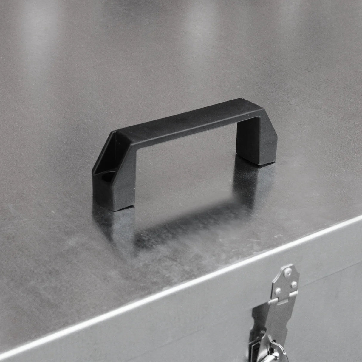 Galvanised Feed Store with three compartments, featuring a sturdy black handle and a sleek metallic finish for durability