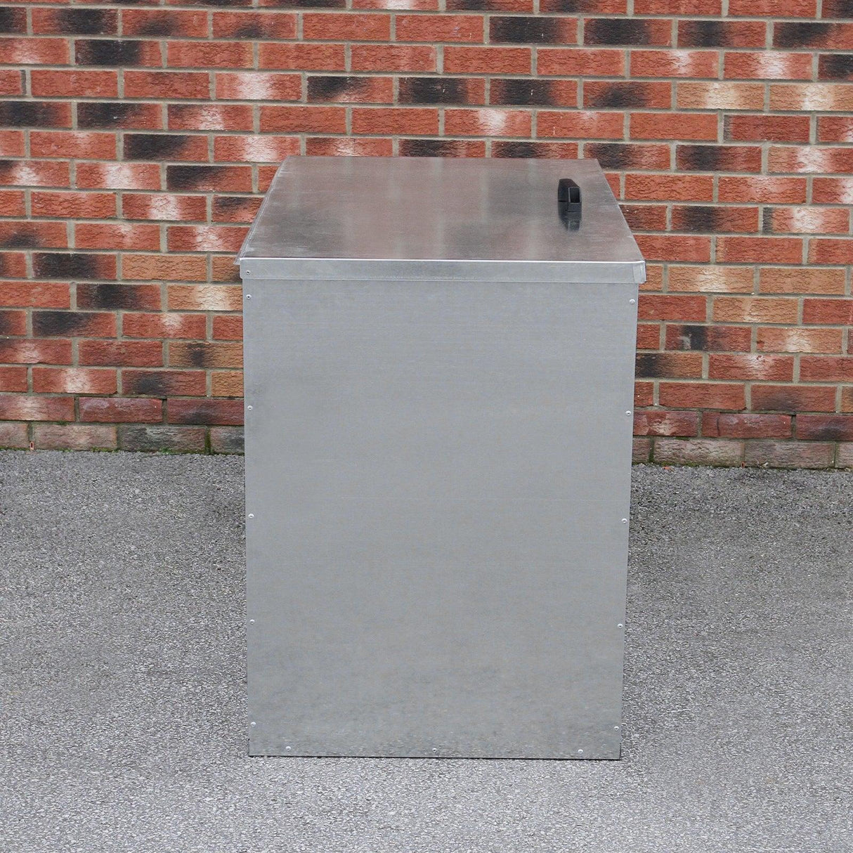 Galvanised feed store with three compartments, featuring a sleek silver finish, sturdy construction, and a convenient handle on top