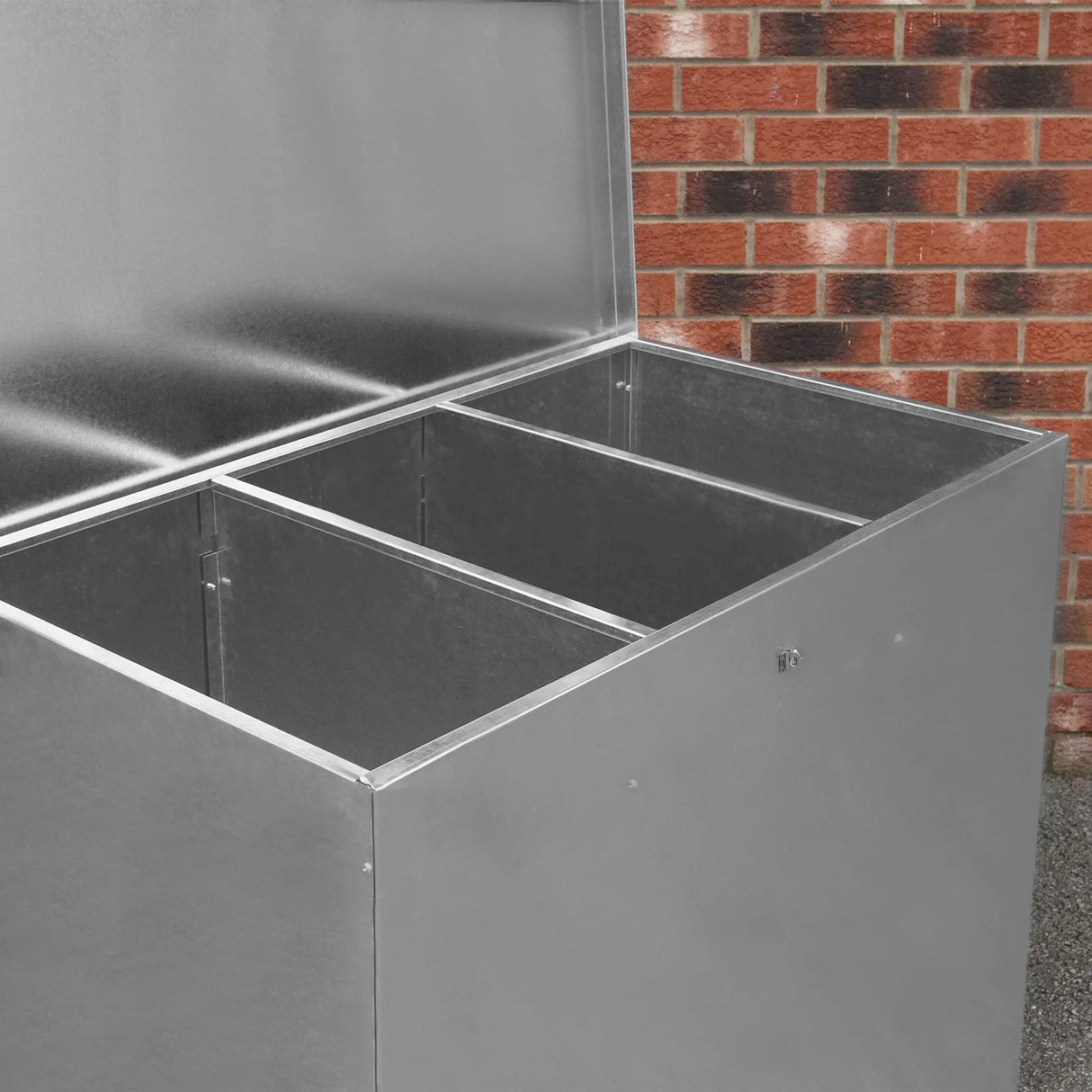 Galvanised feed store with three spacious compartments, featuring a sleek metallic finish and sturdy construction, ideal for outdoor use