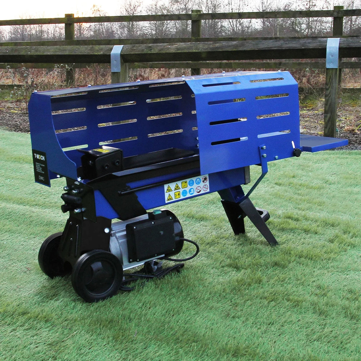 T-Mech 7T log splitter in vibrant blue, featuring a sturdy design, safety labels, and a compact build for efficient wood splitting