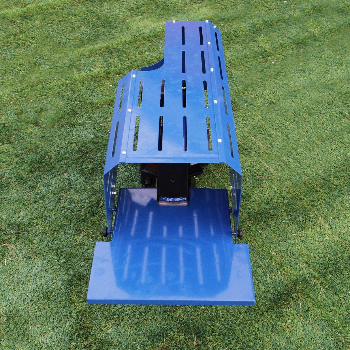 T-Mech log splitter in blue metal with slotted design, featuring a sturdy base and compact shape, ideal for efficient wood splitting