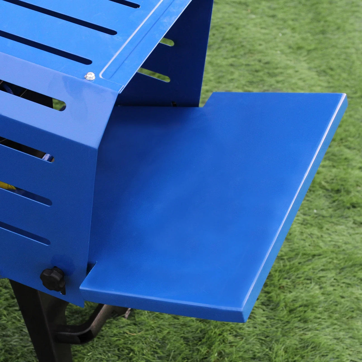 Bright blue log splitter with a sturdy, slotted design and a smooth, flat work surface, ideal for efficient wood processing