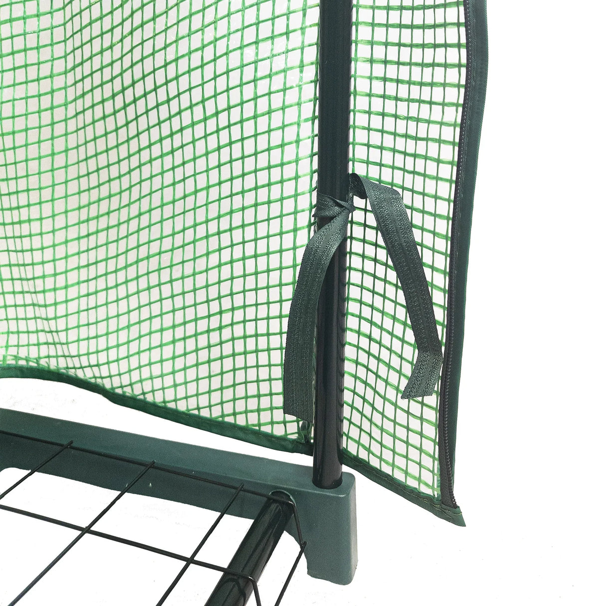 4-tier greenhouse with a green PE cover, featuring a grid pattern and secure ties, ideal for plant growth and protection