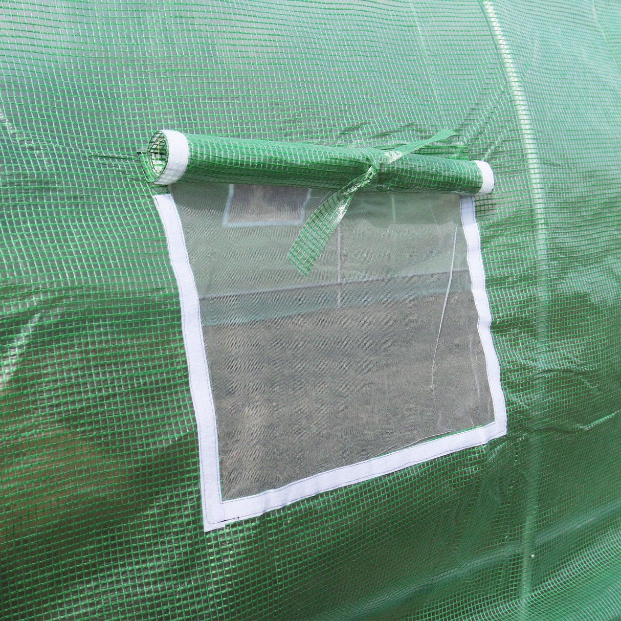 Green mesh window on a 3m x 2m polytunnel, showcasing racking inside for organized plant growth and ventilation options