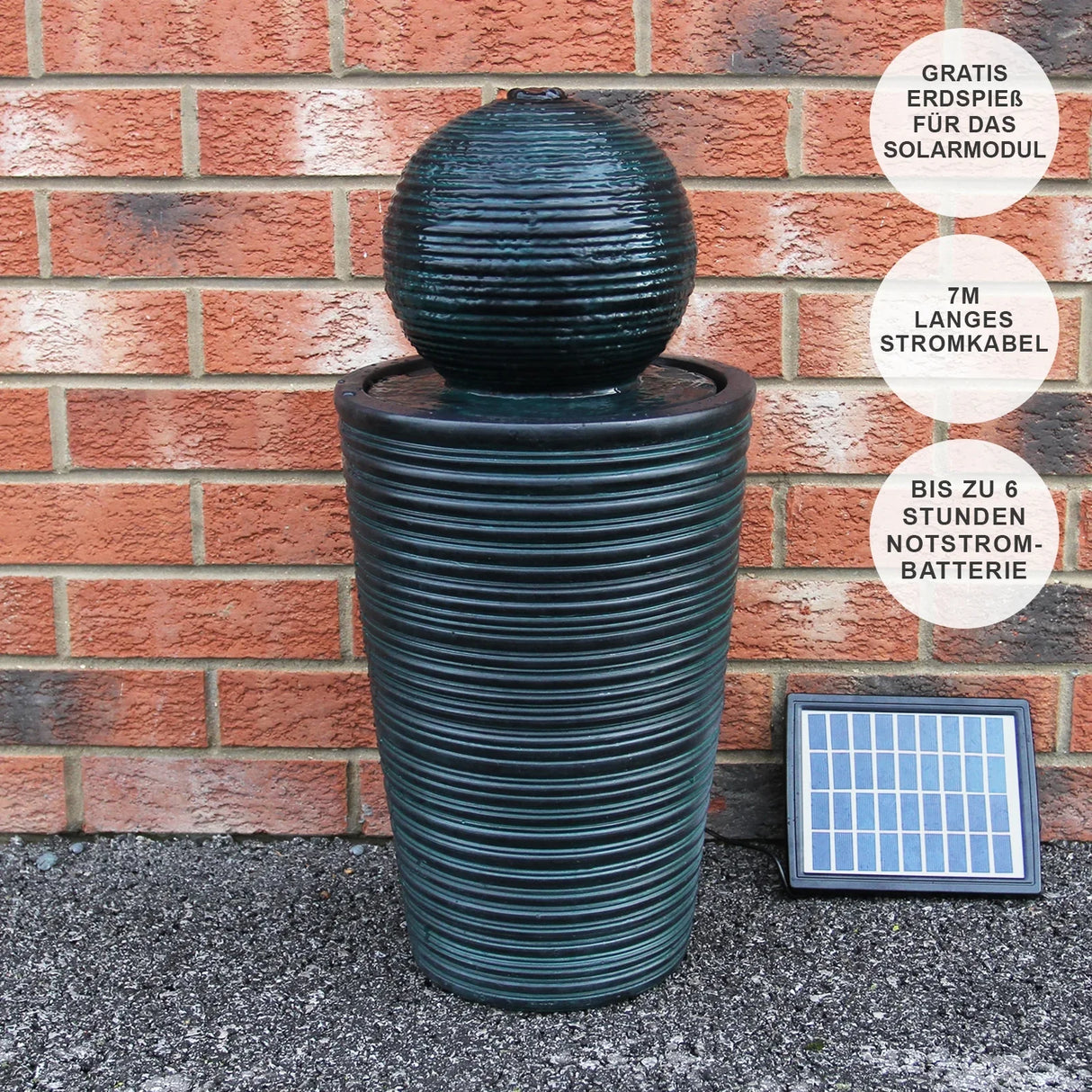 Round ball solar water feature with textured dark green finish, featuring a spherical top and cylindrical base, includes solar panel