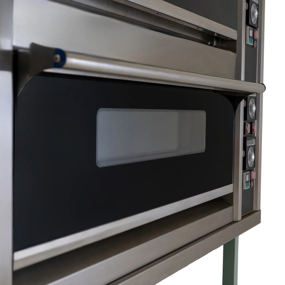 Large commercial pizza oven with stainless steel finish, dual compartments, and temperature controls for efficient baking