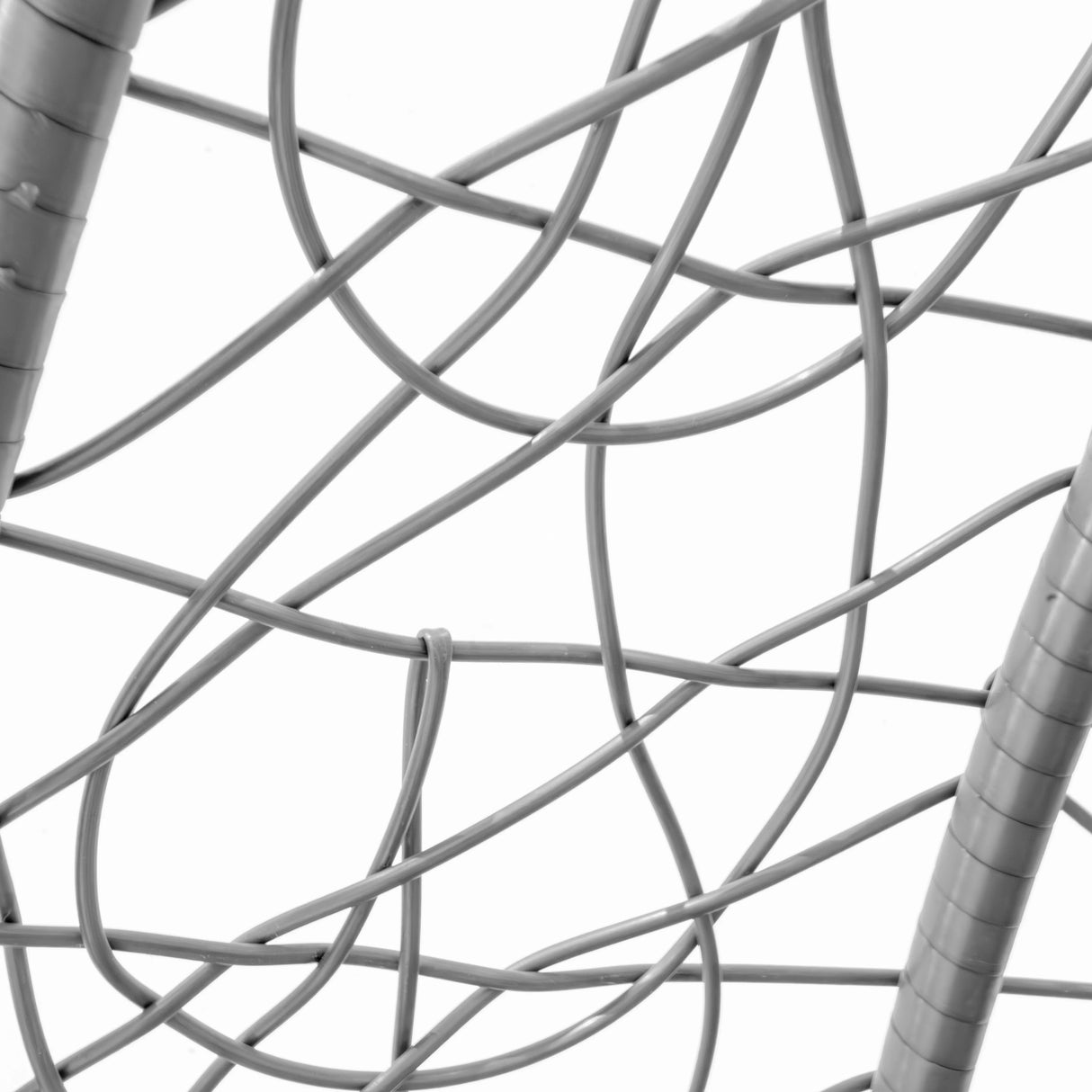 Grey rattan egg chair close-up, showcasing intricate woven patterns and smooth textures, ideal for stylish indoor or outdoor seating