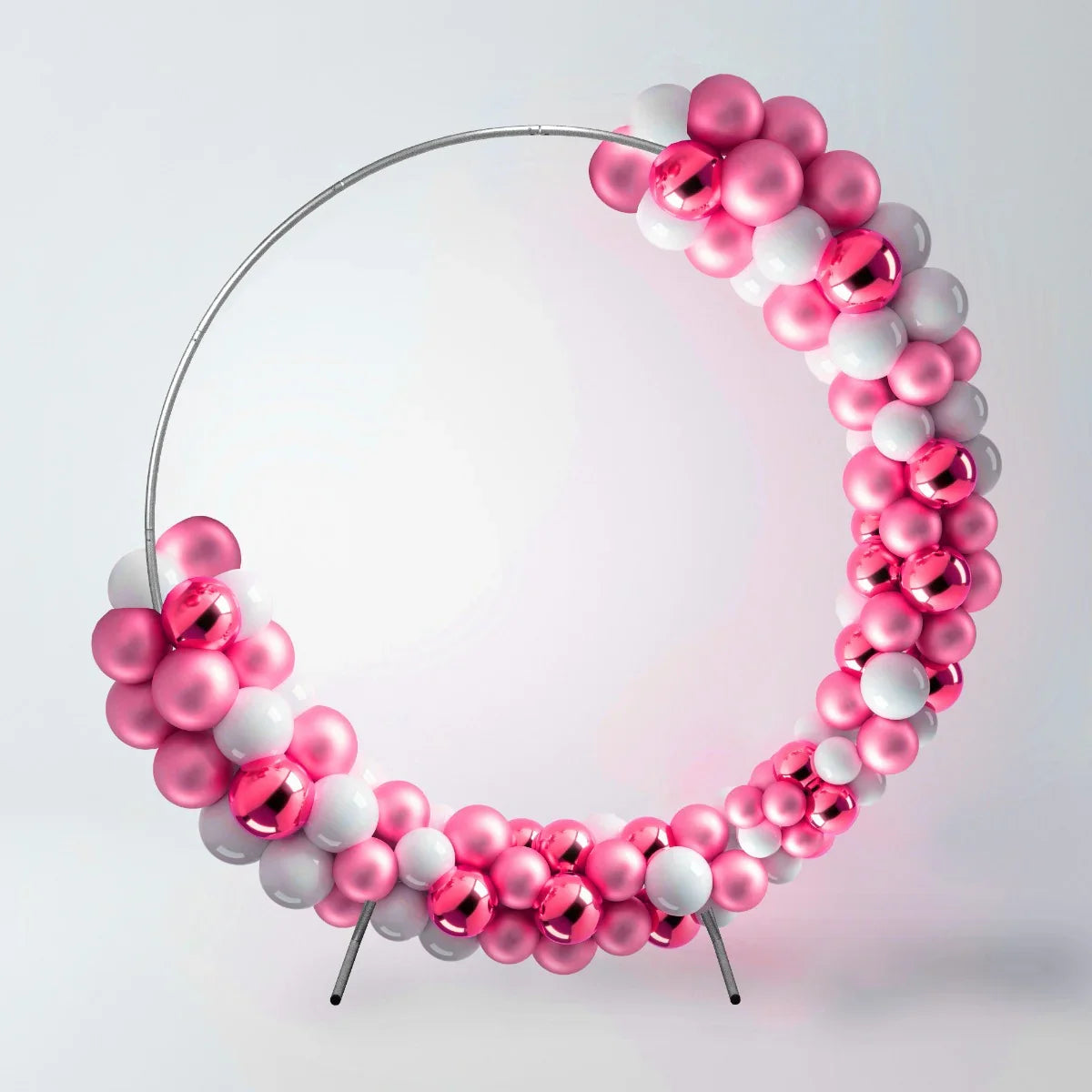Silver wedding moongate arch adorned with pink and white balloons, featuring a sleek circular design and a glossy finish