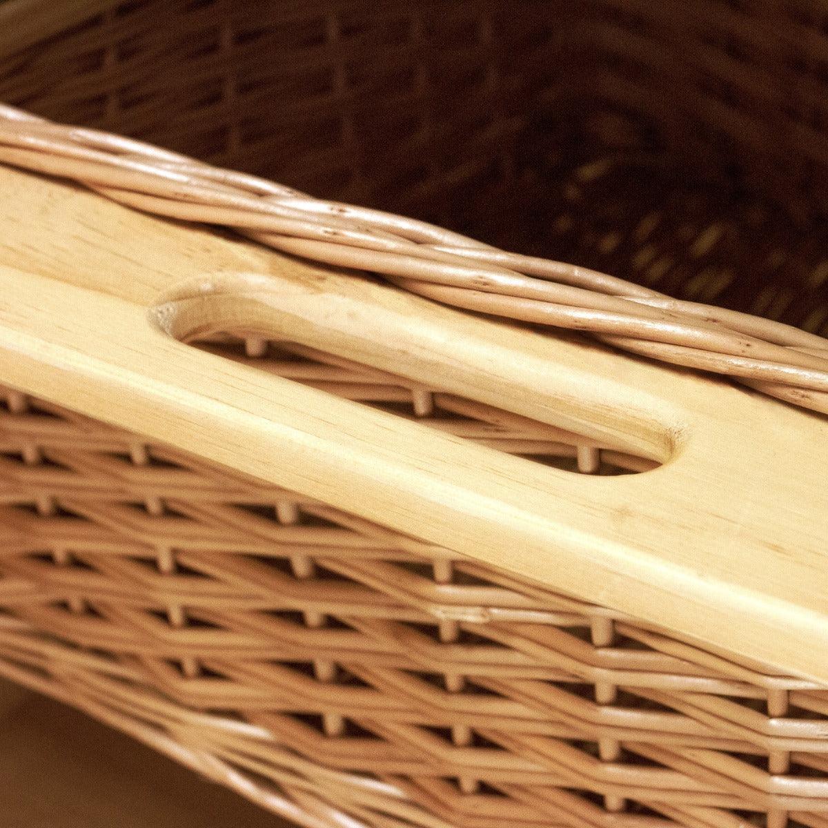 Pull out wicker kitchen basket with a smooth wooden handle, featuring a natural woven texture and warm brown tones