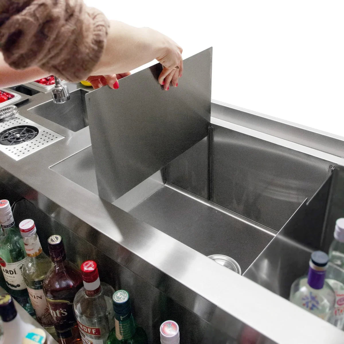 Stainless steel KuKoo Double Cocktail Bar Station with a removable divider, showcasing bottles and a sleek, modern design