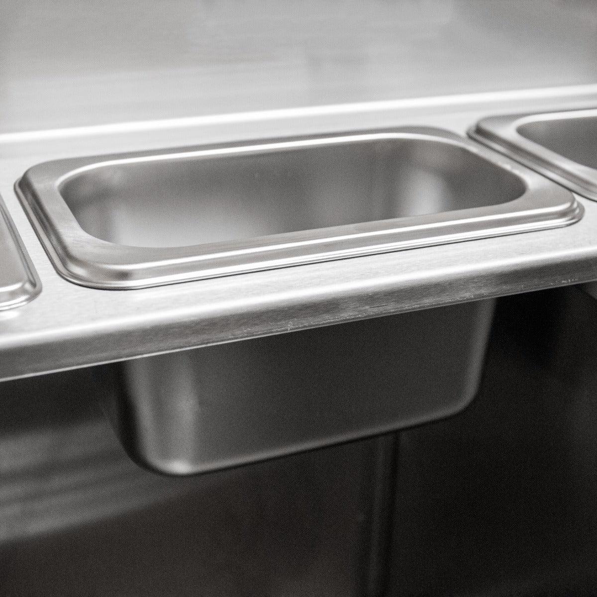 Stainless steel double cocktail bar station with deep, rectangular compartments for efficient drink preparation and storage