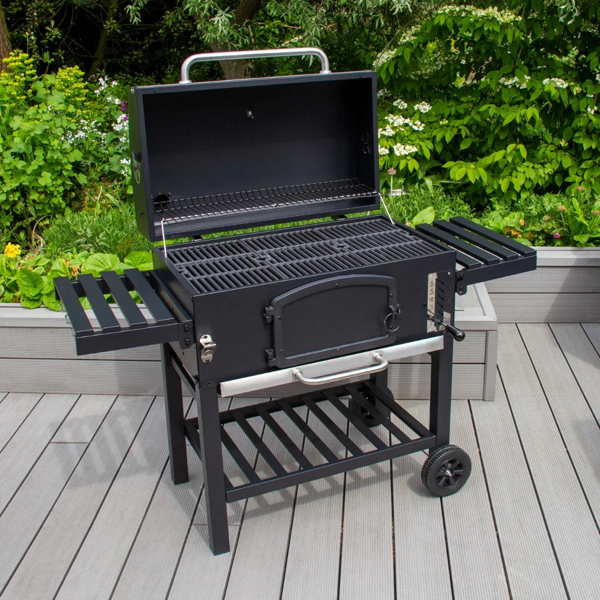 XXL BBQ smoker with a sleek black finish, spacious grilling area, side shelves, and sturdy wheels for easy mobility in outdoor settings
