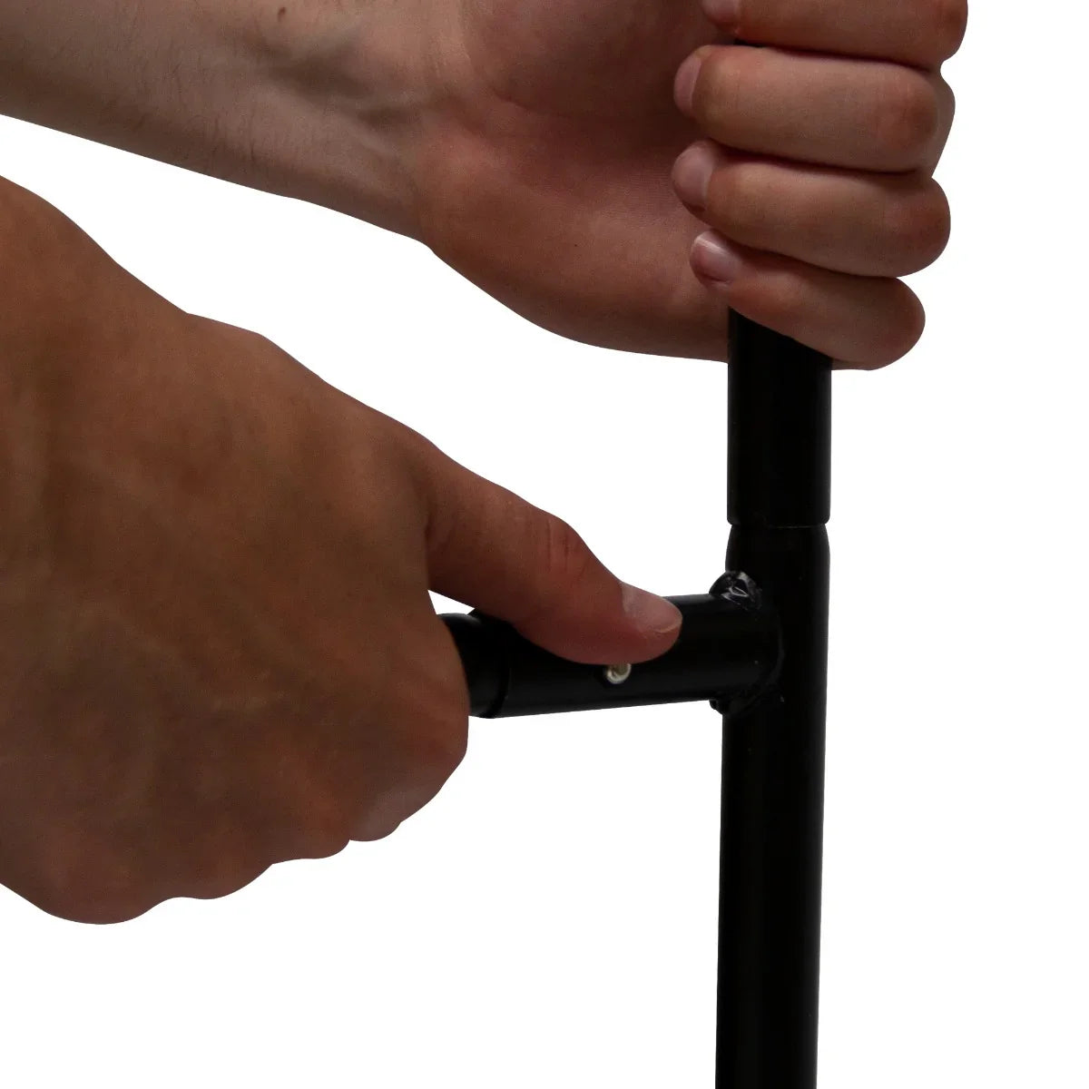 Hands adjusting the frame of a large bike tent, showcasing the sturdy black metal poles and secure locking mechanism for stability
