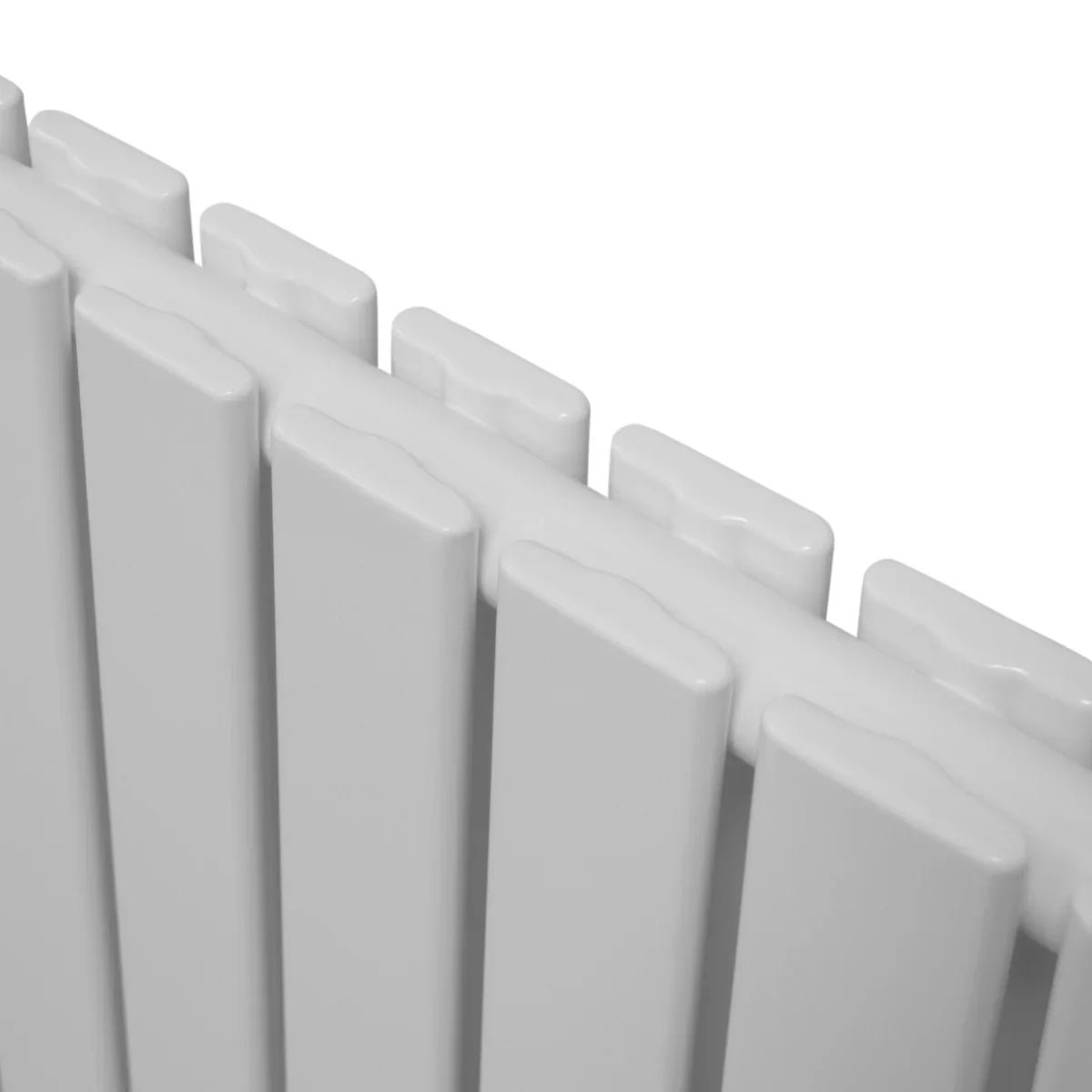 Gloss white designer flat panel radiator with sleek vertical fins, measuring 600mm x 1400mm, showcasing a modern finish and smooth texture