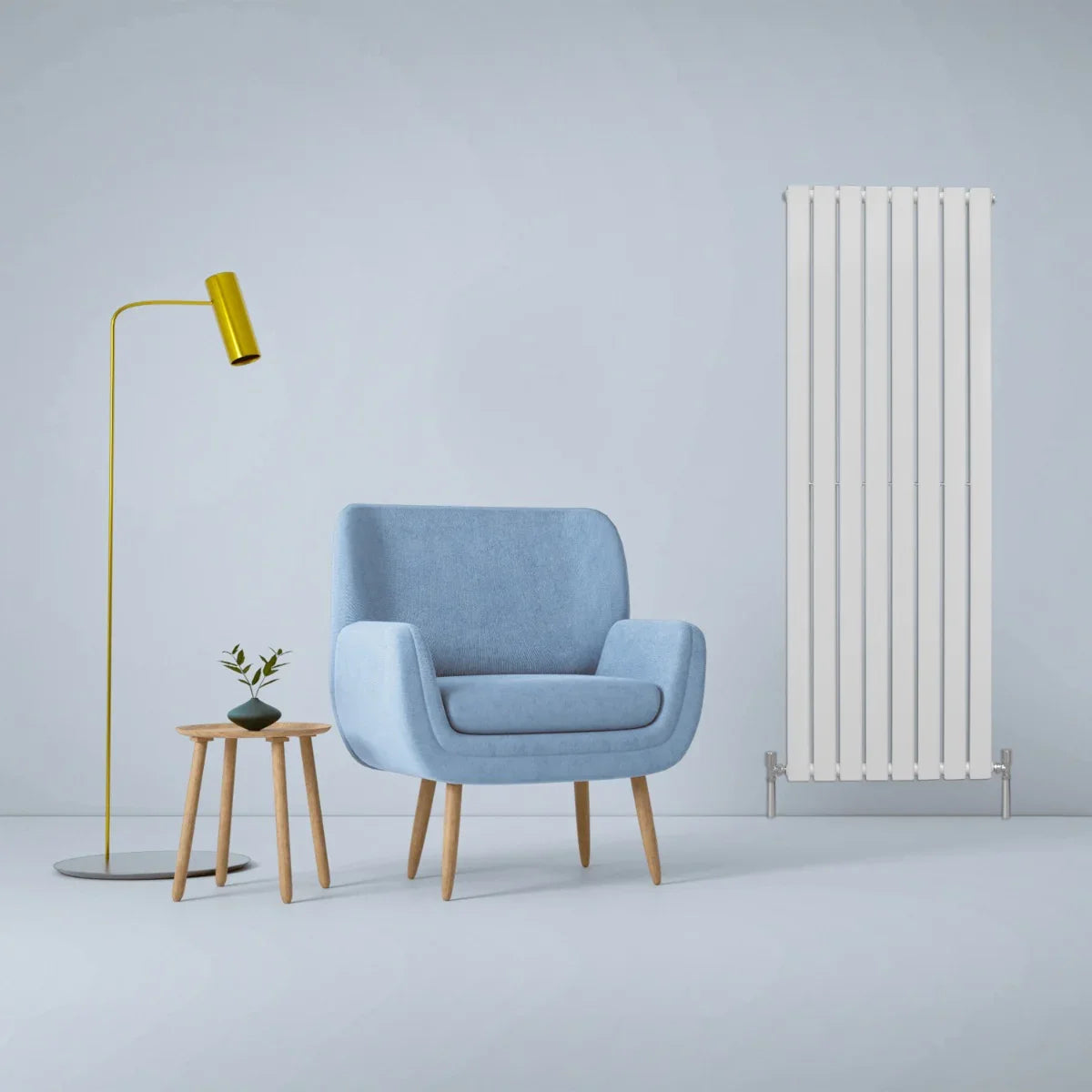 Gloss white designer flat panel radiator, 1600mm x 560mm, sleek vertical design, complements modern decor with a cozy blue armchair and stylish lamp