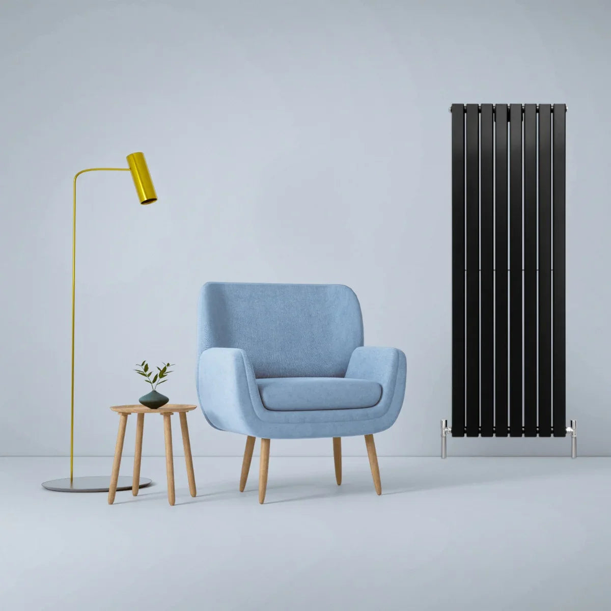 Matt black designer flat panel radiator, 1600mm x 560mm, sleek vertical design paired with modern blue chair and stylish lamp