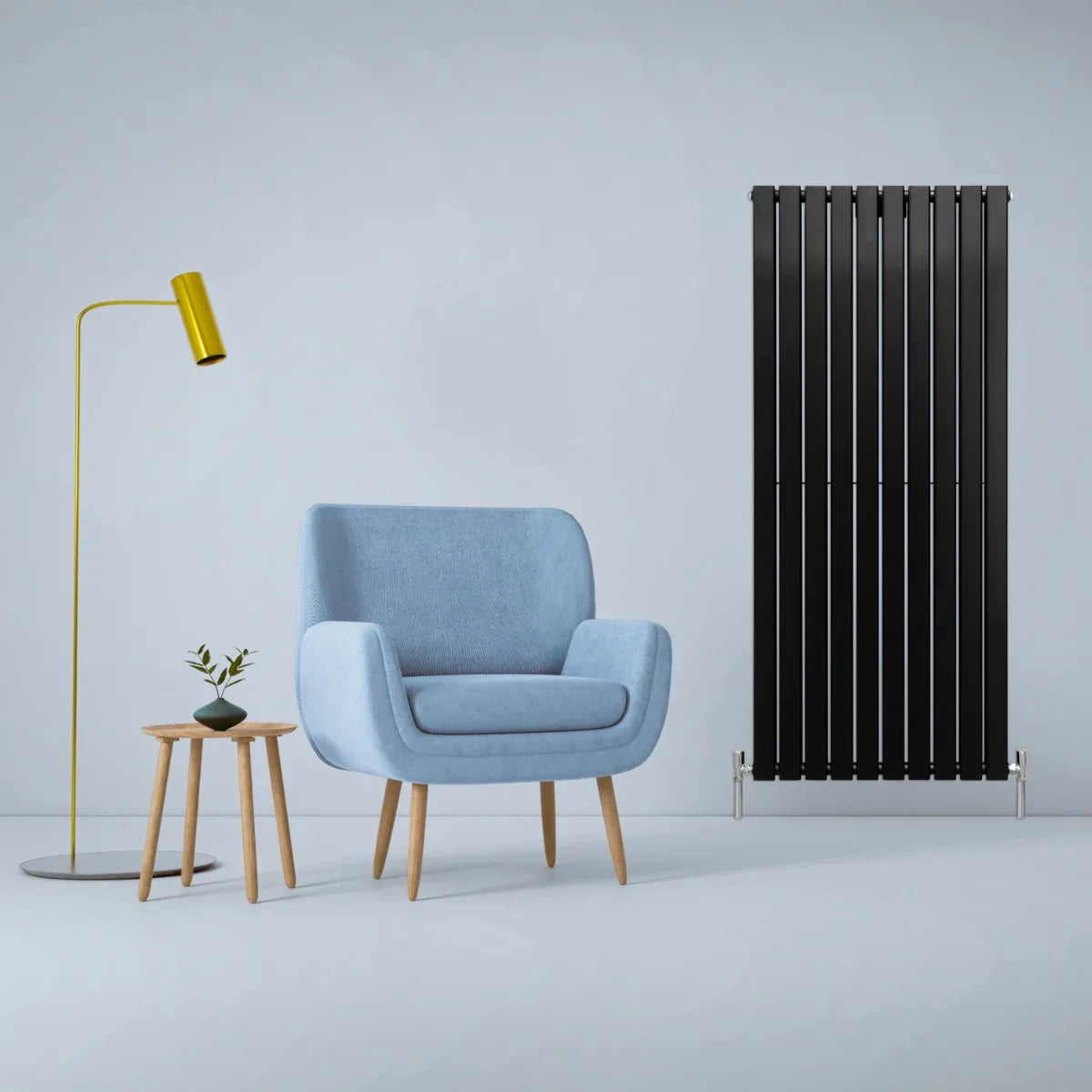 Matt black designer flat panel radiator, 1600mm x 700mm, sleek vertical design, modern aesthetic, complements blue chair and decor