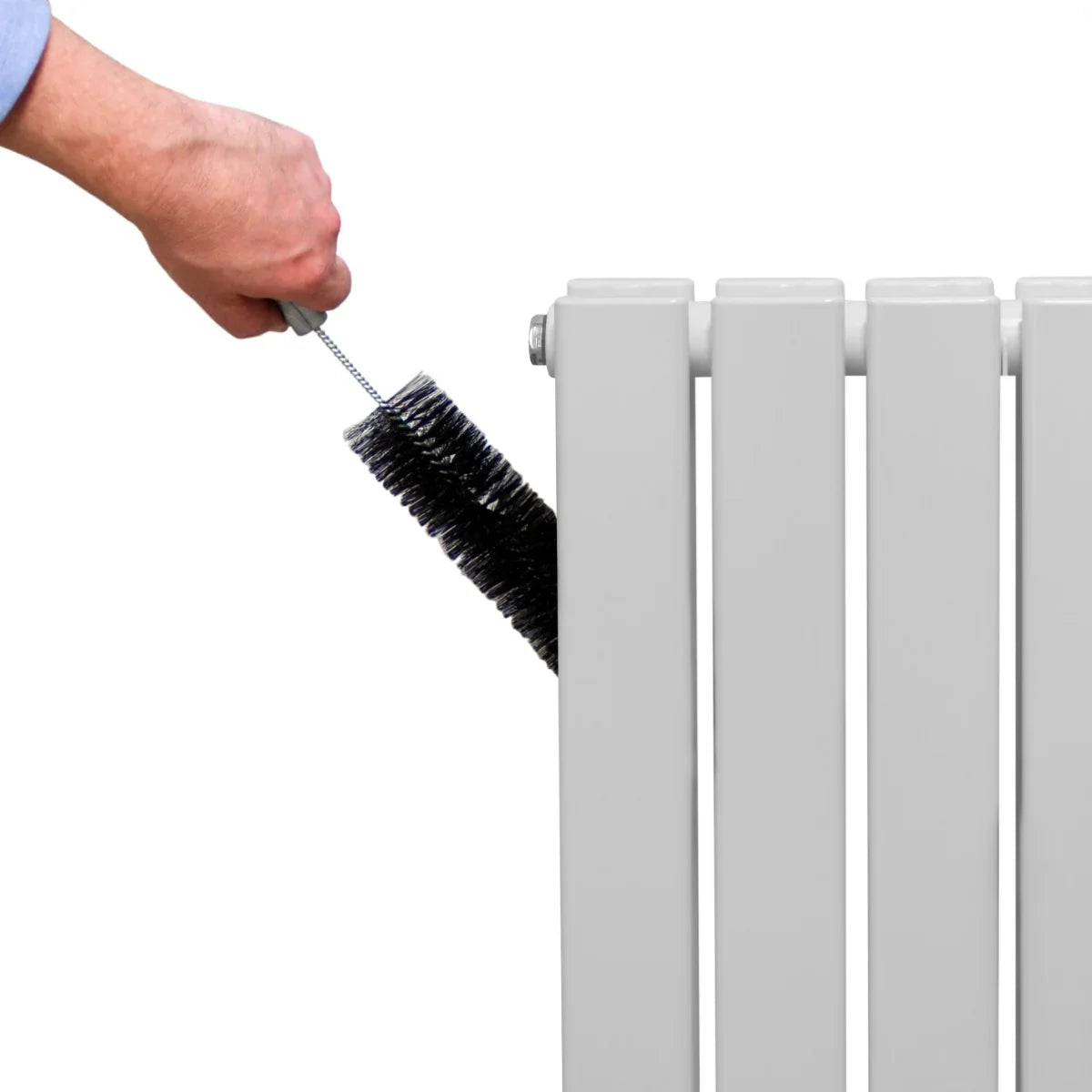 Gloss white designer flat panel radiator being cleaned with a brush, showcasing its sleek, modern design and smooth finish